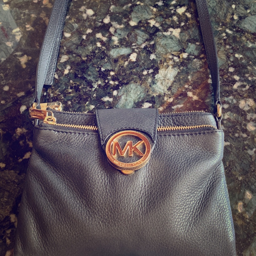 Michael Kors black and gold crossbody bag
